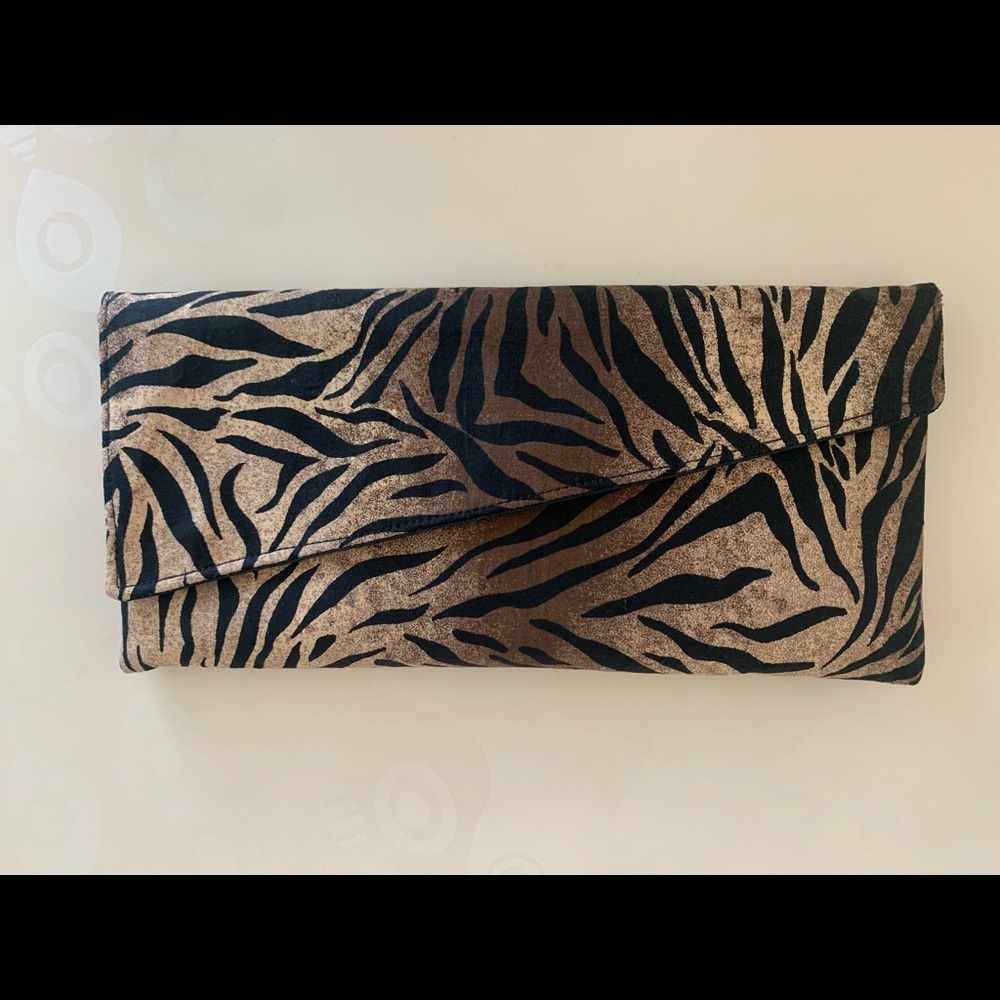 Handmade “ROAR” clutch